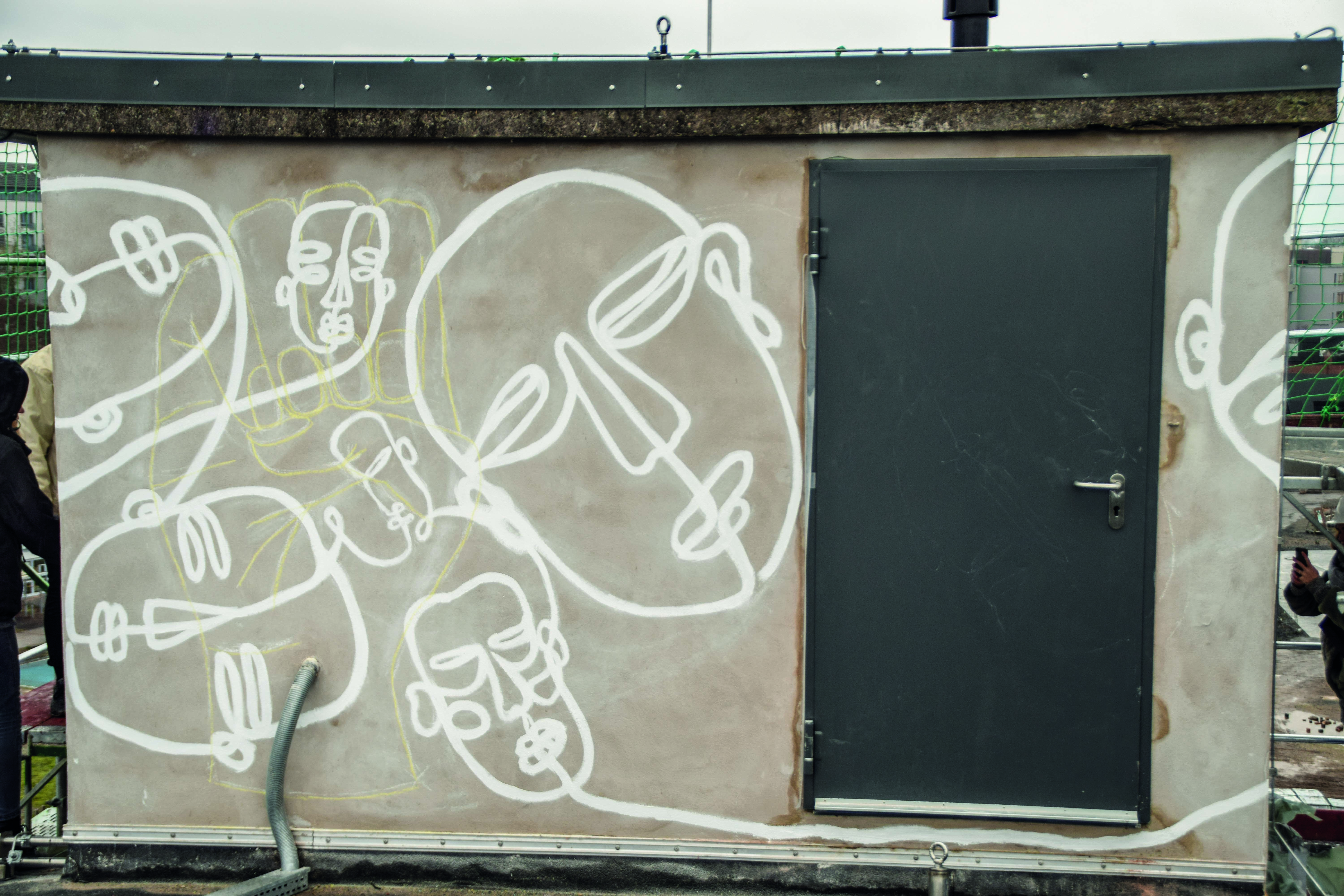 „WIR ALLE“: Mural auf dem Uni-Gebäude 